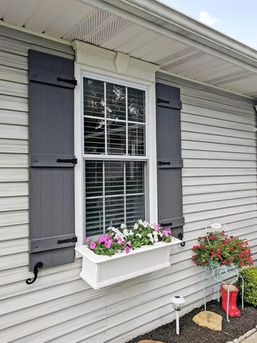 Vista 2 de Polaris Homeside 4 Board and Batten Joined Vinyl Shutters - 1 par de persianas de vinilo de 14-1/2 pulgadas x 63 pulgadas - 410 Gris