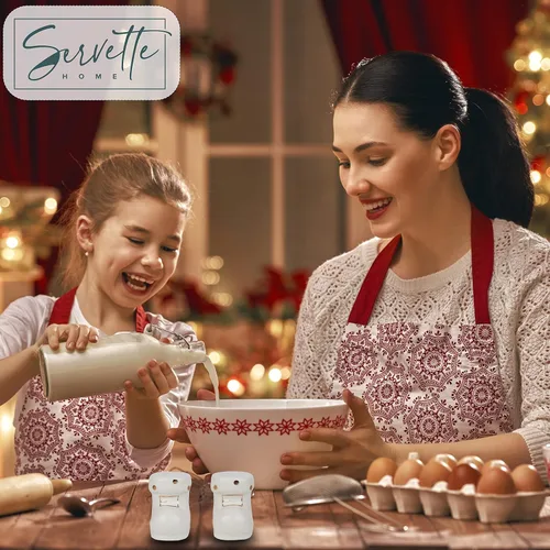 Vista 2 de Salero y pimentero con temática navideña, botas de invierno blancas y doradas para decoración del hogar y la cocina