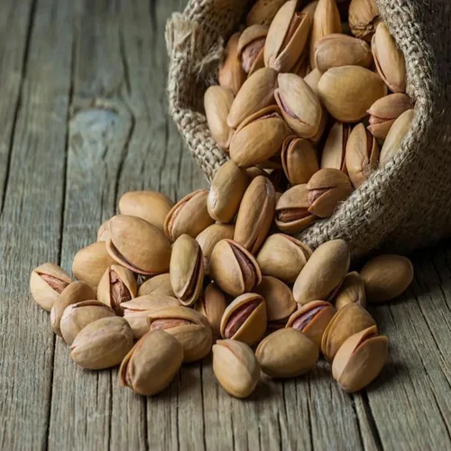 Vista 3 de Pistachos turcos Antep asados salados, en cáscara, tenemos nueces (1 libra).