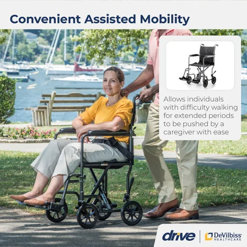 Vista 2 de Drive Medical TR39E-SV Silla de ruedas ligera plegable para transporte con soporte para pies movibles, plateada