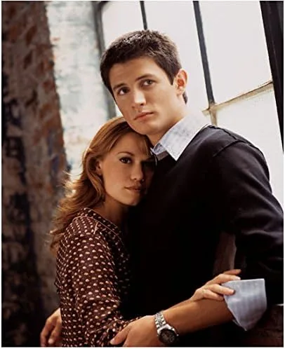 James Lafferty 8 inch x 10 inch Photograph One Tree Hill (TV Series 2003-2012) Holding Bethany Joy Lenz in Front of Window kn