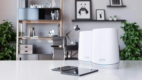 Vista 7 de Netgear Orbi Sistema WiFi 6 mallado tri-banda para todo el hogar (RBK752), rúter con 1 extensor de satélite, cobertura de hasta 464 m2, 40