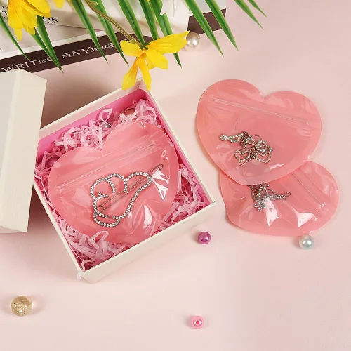Vista 7 de HRX Package 100 mini bolsas para pequeñas empresas, bolsas de joyería en forma de corazón de 2 x 3 pulgadas, bolsas de Mylar transparentes