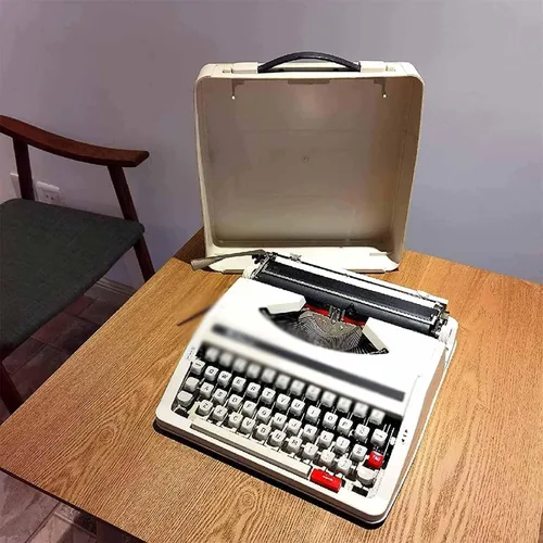 Máquina de escribir manual portátil tradicional, máquina de escribir vintage para un flujo nostálgico, diseño retro anticuado, perfecto para