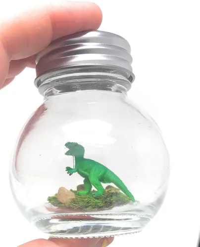 Vista 5 de Mini escritorio de dinosaurio de 1 pulgada T-Rex verde para mascotas con certificado de adopción
