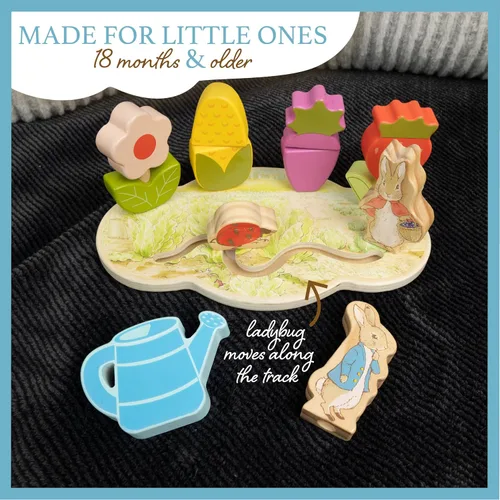 Vista 4 de Kids Preferred Peter Rabbit Garden - Apilador de actividades de madera con 12 piezas interactivas de madera para bebés, niños pequeños y niños