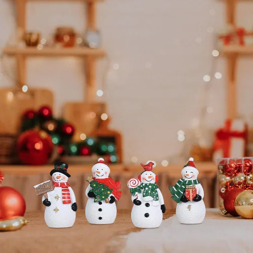 Vista 9 de MEETYAMOR Decoraciones navideñas para interiores, 4 adornos de resina de muñeco de nieve para decoración de mesa de Navidad, figuras coleccionables