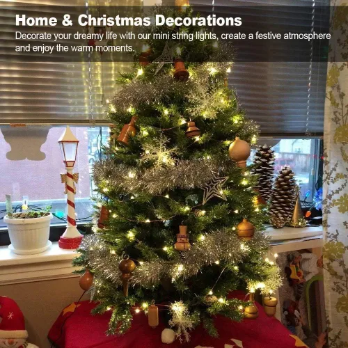 Vista 5 de MUMUXI Paquete de 24 luces de hadas con pilas, 20 luces LED impermeables de 7.2 pies, alambre plateado, luces estrelladas de luciérnaga para bodas