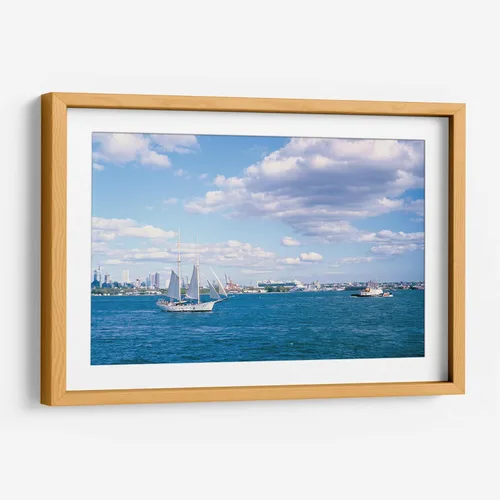 Vista 12 de Canvas Lab Sailboat leaving Manhattan by Raúl Ruz 11 x 7 in Fine Art Framed Print, Frame Color: Black, With Mat Scenery, Beaches and seas