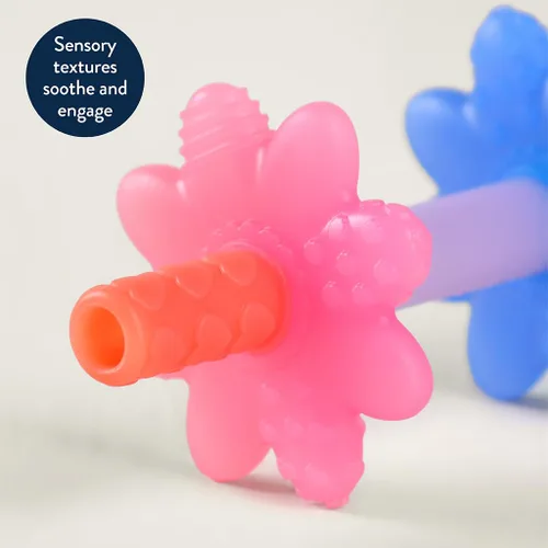Vista 5 de Itzy Ritzy Teensy Tube Teether; Tubo de dentición de silicona con textura hueca para bebé que llega a los dientes frontales y molares posteriores