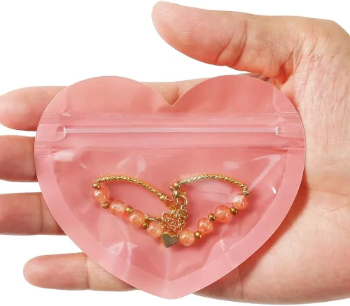 Vista 3 de HRX Package 100 mini bolsas para pequeñas empresas, bolsas de joyería en forma de corazón de 2 x 3 pulgadas, bolsas de Mylar transparentes