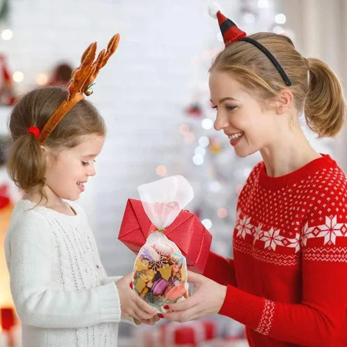 Vista 6 de CCINEE Bolsa de regalo de copo de nieve, bolsa de celofán de Navidad con lazos giratorios, bolsas de galletas de caramelo para suministros