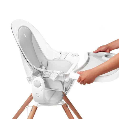 Vista 7 de Munchkin® 360° Cloud™ Silla alta para bebé y niño pequeño con asiento transparente y giro de 360°, color blanco y gris con patas de madera