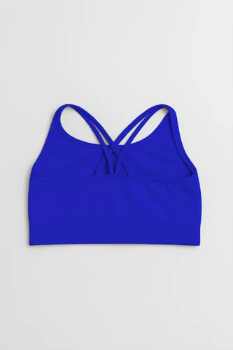 Vista 3 de Kurve Brasier corto elástico sin costuras en la espalda para niña, fabricado en Estados Unidos