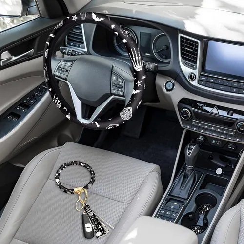 Vista 2 de Juego de 4 piezas de accesorios para auto con estampado de lunas negras y estrellas blancas, funda para volante con estampado de lunas negras