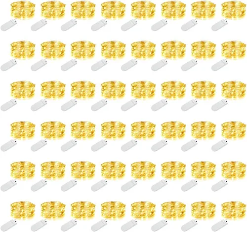 Vista 14 de MUMUXI Paquete de 24 luces de hadas con pilas, 20 luces LED impermeables de 7.2 pies, alambre plateado, luces estrelladas de luciérnaga para bodas