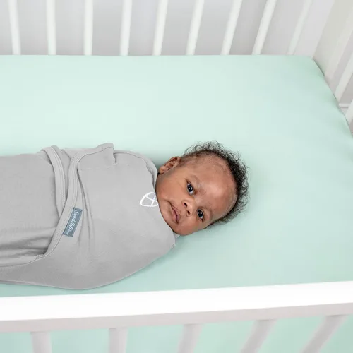 Vista 16 de SwaddleMe by Ingenuity Original Swaddle, 100% algodón, mejora el sueño y calma el reflejo de sobresalto, 0-3 meses, 1.0 TOG, paquete de 3, manta