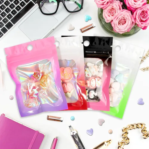 Vista 3 de Paquete de 100 bolsas holográficas de Mylar, bolsa de papel de aluminio transparente con cierre, bolsa de embalaje para almacenamiento de alimentos