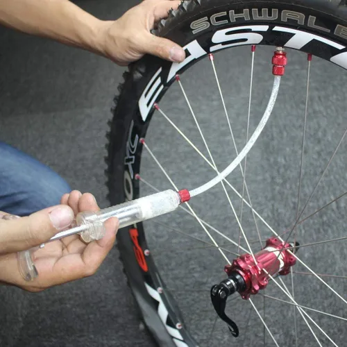 Vista 5 de Jeringa de sellador de neumáticos sin cámara para bicicleta y herramienta de extracción de núcleo de válvula Presta Schrader para Stans sin sellador