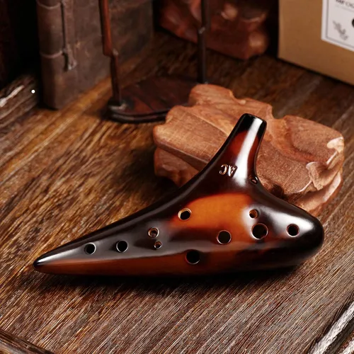 Vista 2 de MIFOGE Ocarina de 12 agujeros en Do Alto con envoltorio de regalo, soporte de exhibición, cordón para el cuello, funda protectora, libro