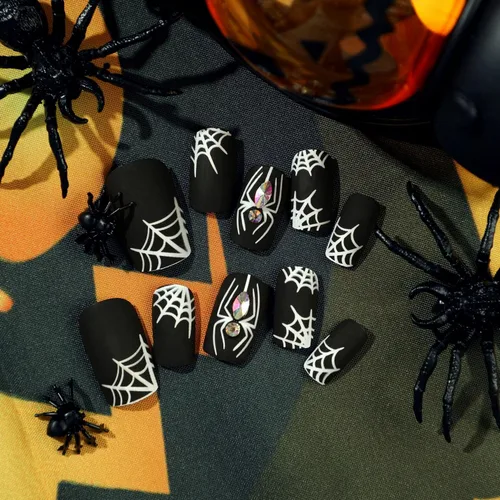 Vista 2 de Uñas postizas medianas a presión de Halloween, con diseños de diamantes de imitación de telaraña blanca, cobertura completa, uñas acrílicas negras