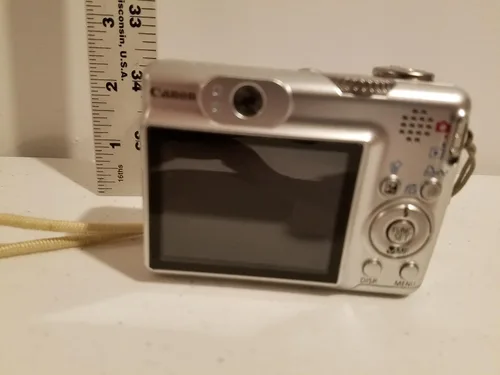 Vista 4 de Canon PowerShot A570IS 7.1MP Cámara digital con zoom estabilizado de imagen óptica 4x (Modelo antiguo)