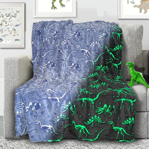 Manta de dinosaurio que brilla en la oscuridad, manta luminosa de dinosaurio para niños, manta de felpa suave azul T-Rex para niños y niñas, grande
