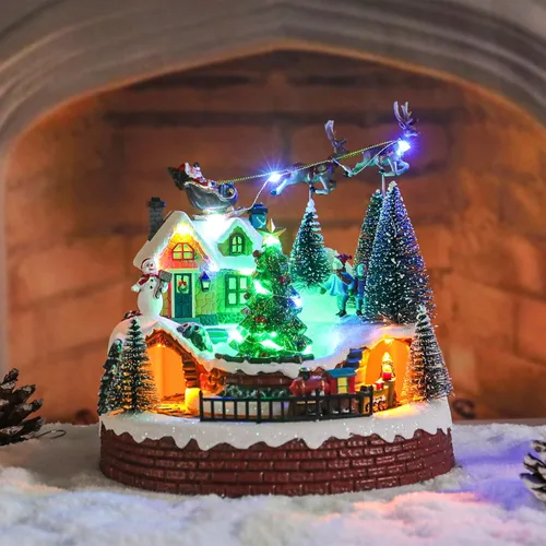 Vista 7 de Vipush Decoraciones de Casa de Pueblo Navideño de Resina Juego de Tren con Papá Noel Volador Decoración del Hogar Interior Figuras de Edificios Tren