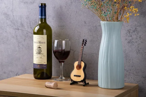 Vista 2 de ALANO Guitarra clásica de madera modelo mini instrumento musical con soporte decorativo regalo (G-10-S)