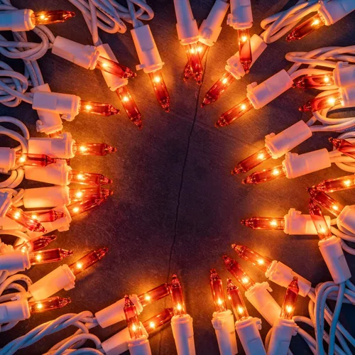 Vista 4 de YULETIME 200 luces de Navidad naranjas, paquete de 2 juegos de 33 pies, 100 luces incandescentes con certificación UL (naranja - cable blanco)