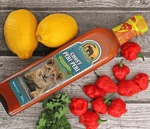 Vista 5 de Ghost Peri-Peri Salsa picante de African Dream Foods Salsa picante totalmente natural Botella de chef de 16.9 onzas líquidas