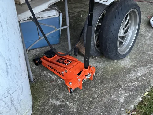Gato de piso resistente de acero de 3 toneladas con bomba rápida - naranja