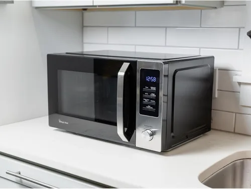 Vista 3 de Microondas de encimera de 1.0 pies cúbicos en acero inoxidable y negro con freidora de aire