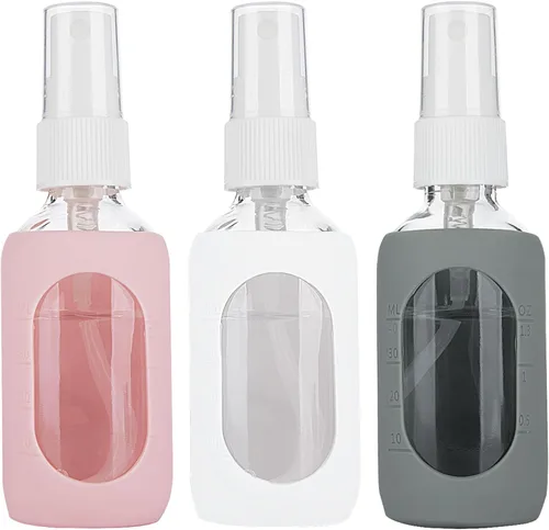 HOMBYS Botellas pequeñas vacías de vidrio transparente de 2 onzas con protección de funda de silicona, recipientes recargables para viajes,