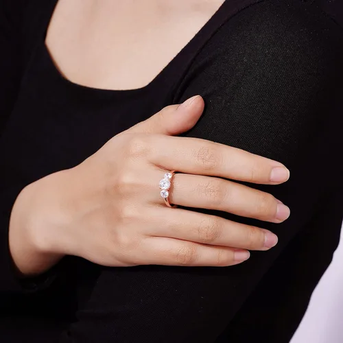 Vista 4 de Tienda Collection Platinum or Gold Plated Sterling Silver Round 3-Stone Ring made with Infinite Elements Cubic Zirconia