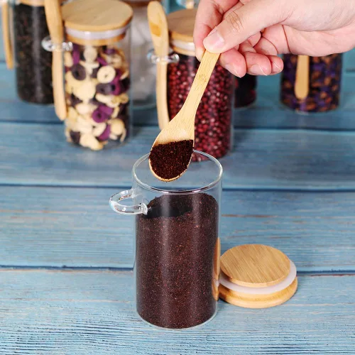 Vista 6 de Tarro de vidrio con tapa y cuchara de bambú, paquete de 8 recipientes de té de 10 onzas para té de hojas sueltas, recipientes de sal y azúcar