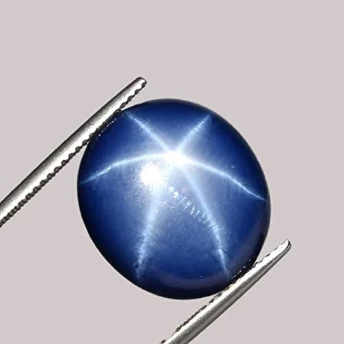 Vista 3 de GEMHUB Hermosas piedras preciosas sueltas de zafiro estrella azul de 950 quilates con forma ovalada BP-879 Gema azul