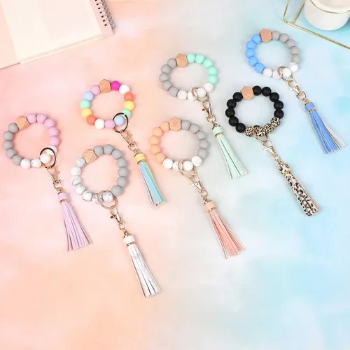 Vista 6 de BAOSIWA Pulsera de cuentas de silicona con llavero de pulsera para mujer con borla de cuero