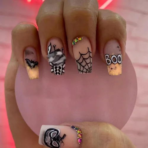 Vista 11 de Uñas postizas medianas a presión de Halloween, con diseños de diamantes de imitación de telaraña blanca, cobertura completa, uñas acrílicas negras