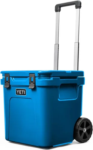 YETI Roadie 48 - Hielera con ruedas y mango retráctil de periscopio