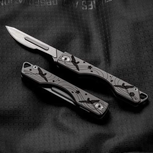 Vista 2 de KeyUnity KK01 Cuchillo plegable de titanio, cuchillo de bolsillo EDC con hoja reemplazable #24, para caza al aire libre, campamento, pesca