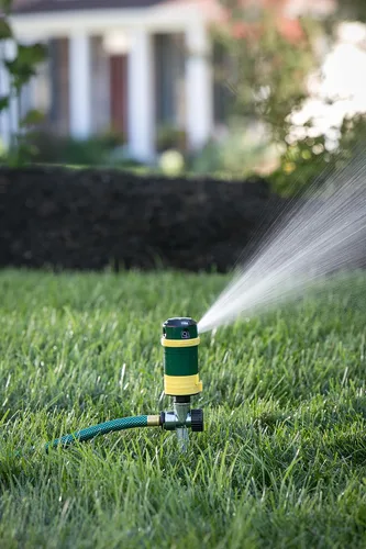 Vista 4 de Melnor 65404AMZ Turbo - Rociador giratorio en estribo, 4 patrones, adaptador de producto QuickConnect, verde, amarillo