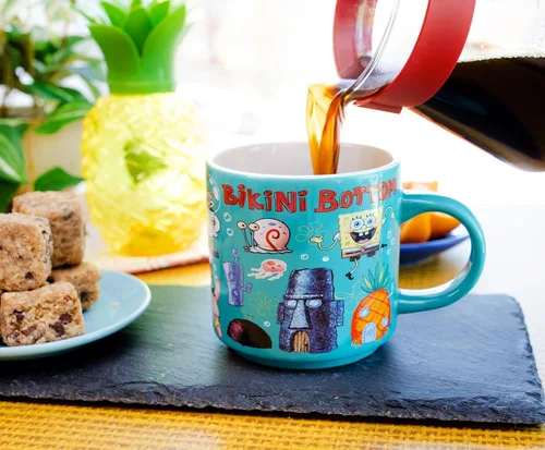 Vista 4 de Nickelodeon - Taza de cerámica con parte inferior de bikini de Bob Esponja, taza de café para expreso, té, cacao, capacidad para 13 onzas