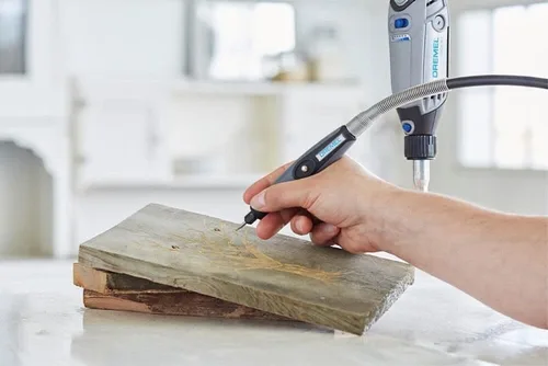 Vista 4 de Dremel 733-01 Kit de accesorios para herramientas rotativas, juego de 20 piezas de tallado de madera, incluye bandas de lijado, brocas de tallado