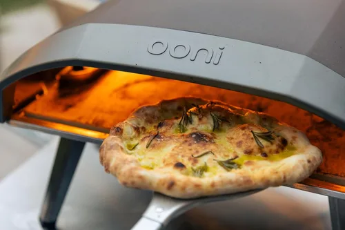Vista 8 de ooni Pala Giratoria para Pizza - Pala para Pizza Perforada de Aluminio de 7 Pulgadas, Volteador de Pizza de Metal Ligero con Mango Largo