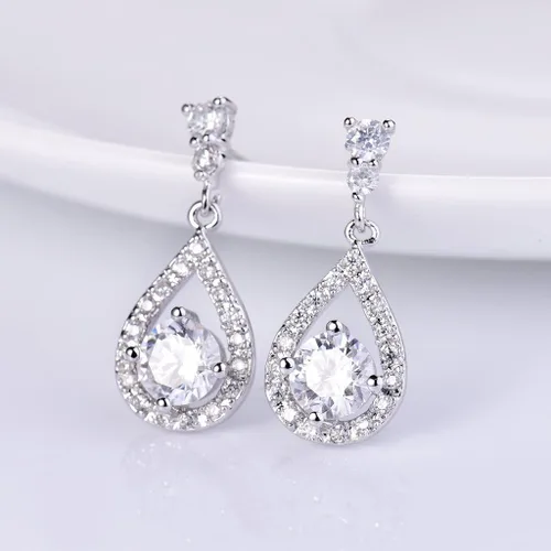 Vista 3 de GULICX Aretes de gota de cristal de circonita cúbica de corte redondo impecable, con base chapada en plata, color blanco, Plata, Circonia cúbica