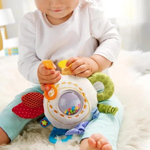 Vista 2 de HABA Mordedor Cuddly Rainbow Round - Juguete de actividad suave con elementos de sonajero y dentición, multicolor