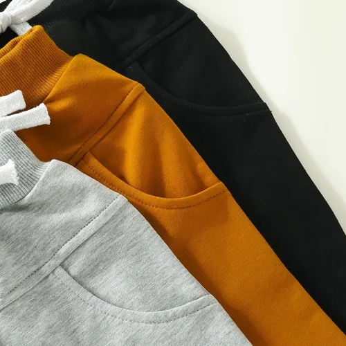 Vista 4 de Paquete de 3 pantalones deportivos de algodón con cintura elástica de color sólido para bebés y niños pequeños
