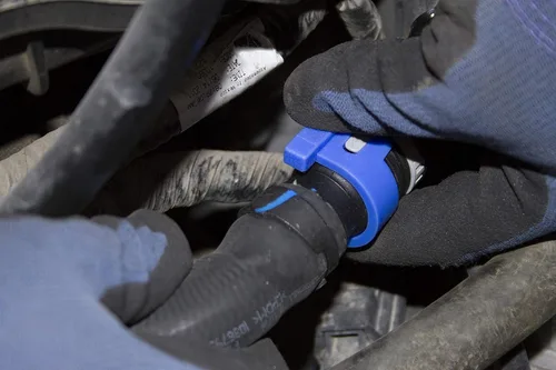 Vista 4 de Lisle 39200 Desconexión de manguera de calentador para Ford 2.0L, azul