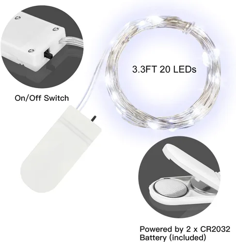 Vista 7 de Paquete de 24 luces de hadas que funcionan con pilas, 3.3 pies, 20 luces LED blancas frías, tira de luces LED impermeables para bodas, fiestas